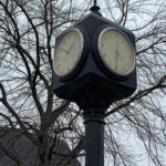 The clock at the library in downtown Salem, Virginia evinces a temporal anomaly.  It stands between the big library building and a Little Free Library installation along the sidewalk.  You’ll have noted the macrocosm/microcosm at play, as we did.  There is a vacuum between macrocosm and microcosm, “a void of apparent godlessness” (Franklyn Wepner). You’ll recall Isaac Newton and René Descartes’ watchmaker analogy that argued for the existence of an intelligent designer of a mechanical universe.  In a void of such a watchmaker … well, QED.